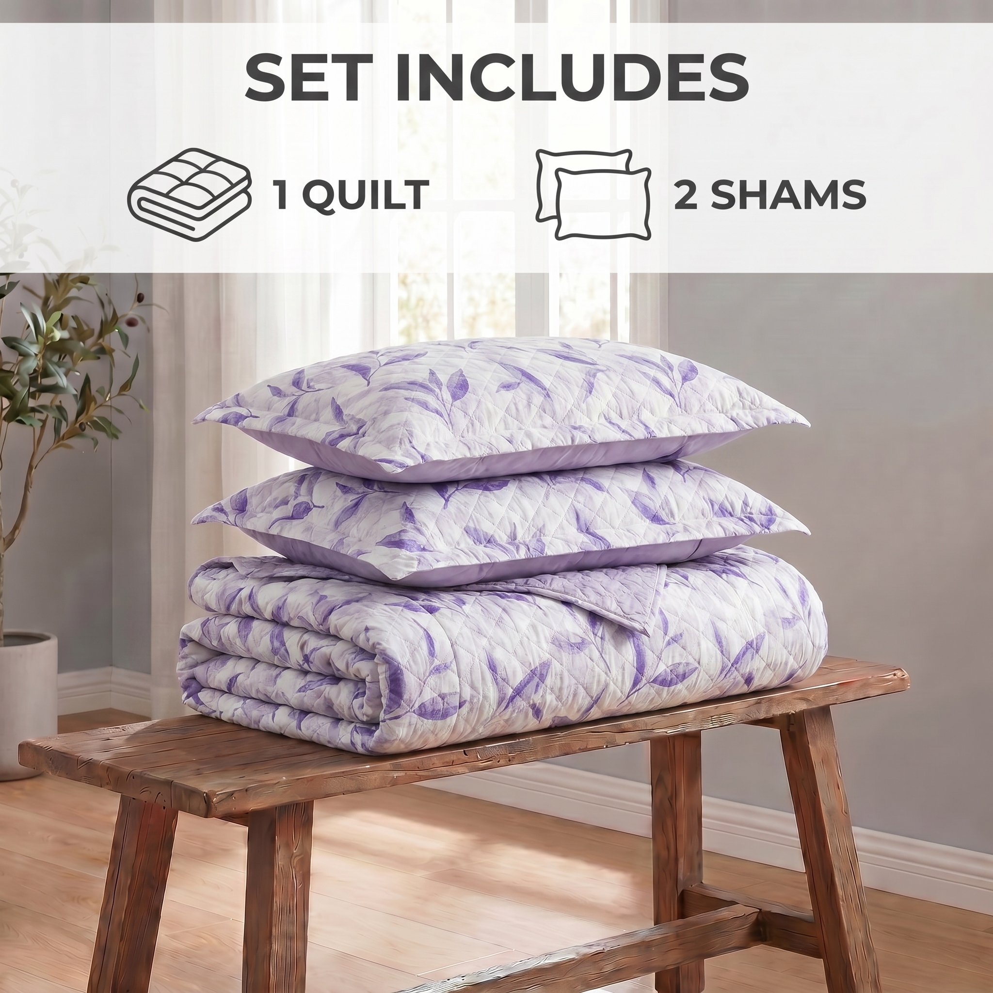 Purple floral quilt and shams set on a wooden bench with room background
