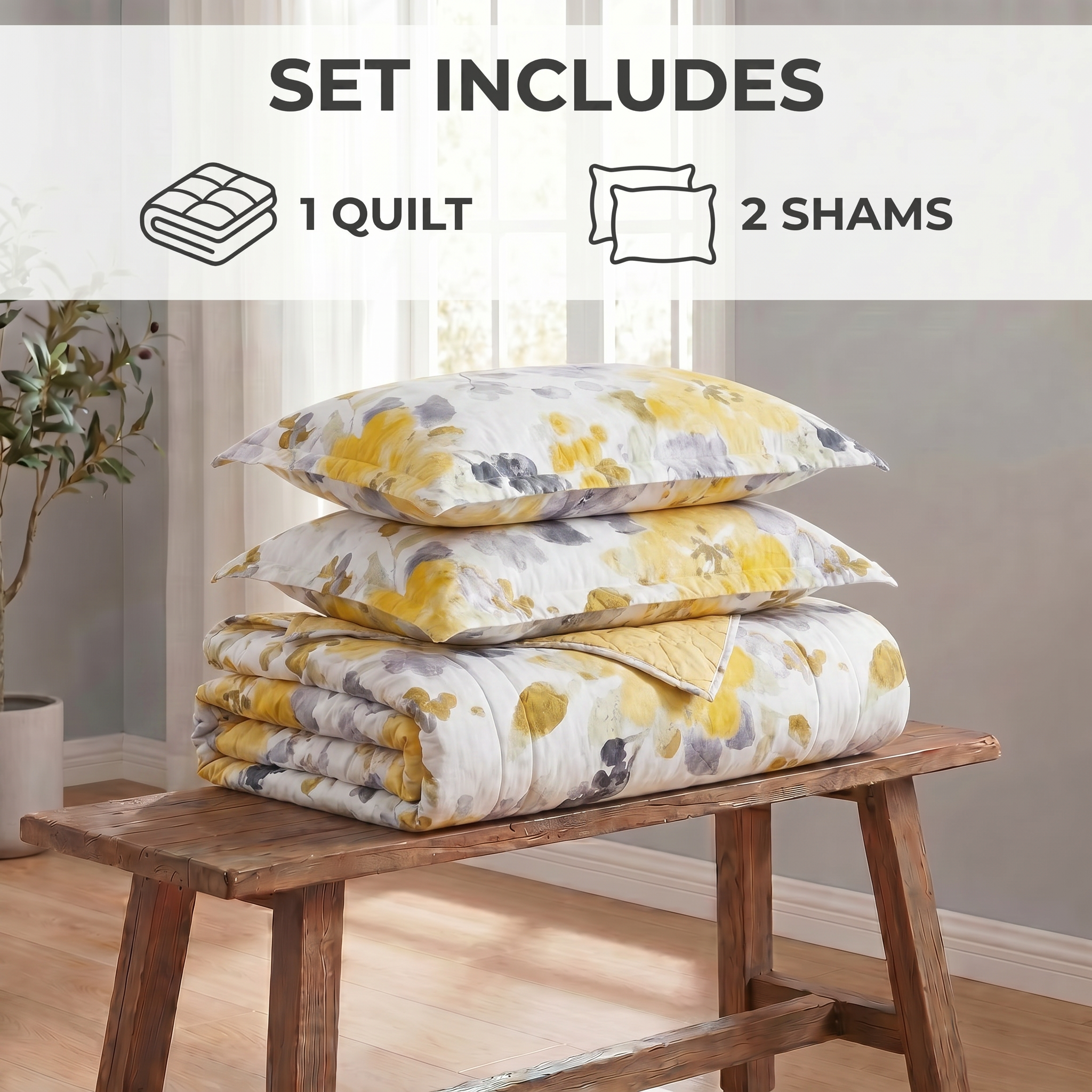 Floral quilt and shams set on a wooden bench with room background