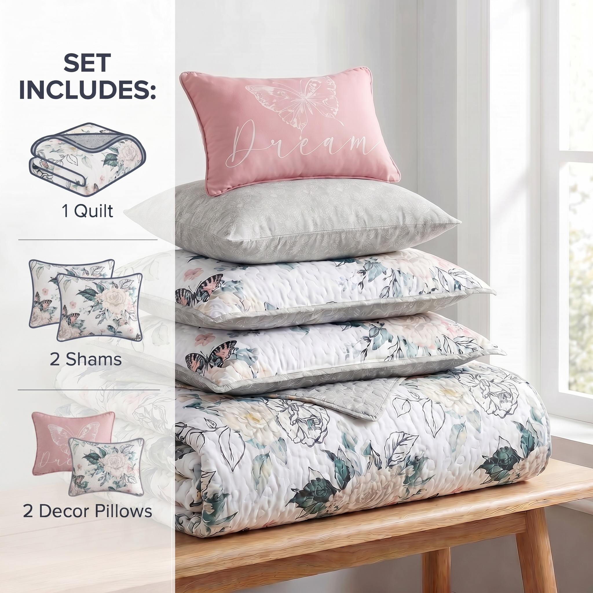 Set of bedding including a quilt, shams, and decor pillows on a wooden bench.
