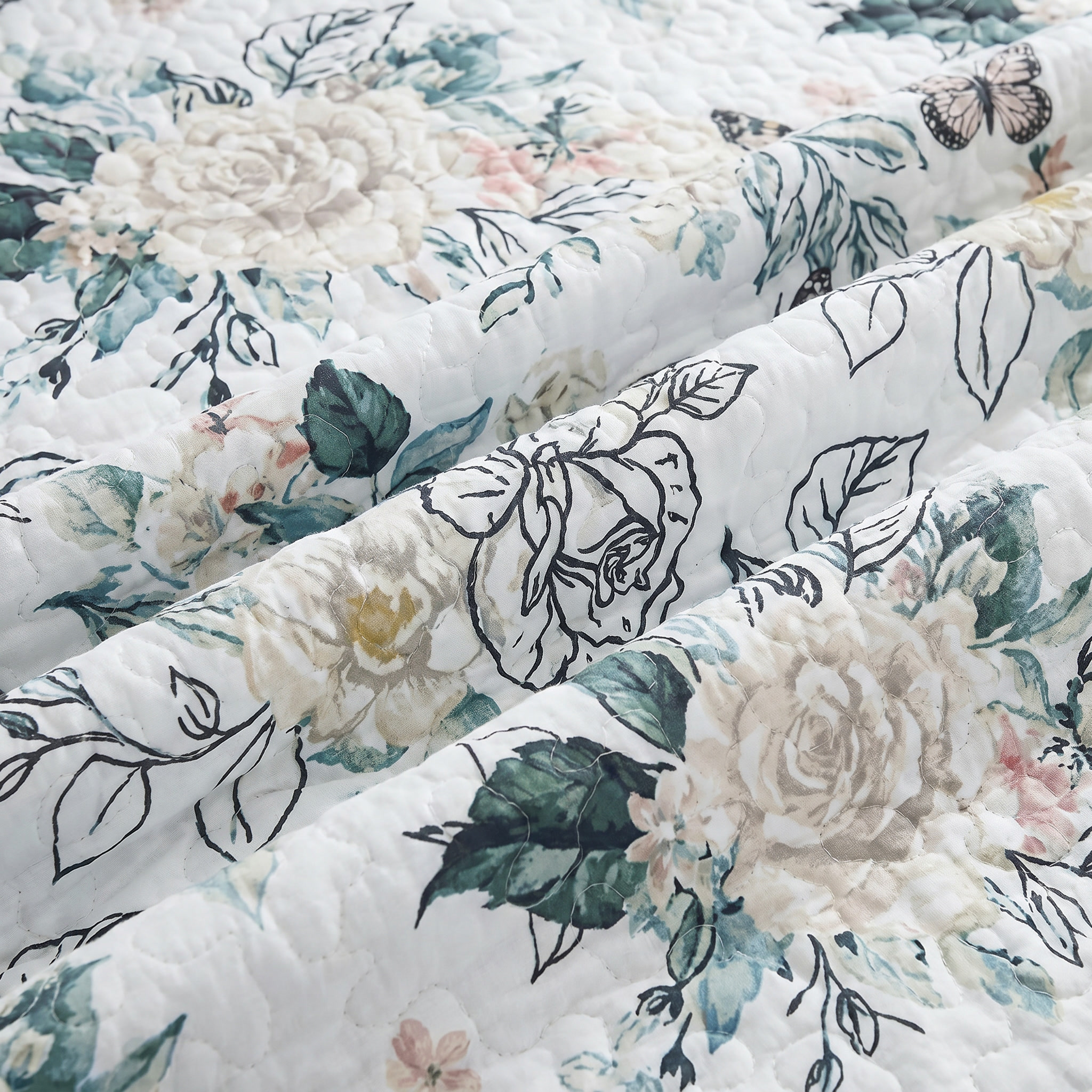 Floral fabric with roses and leaves on a white background
