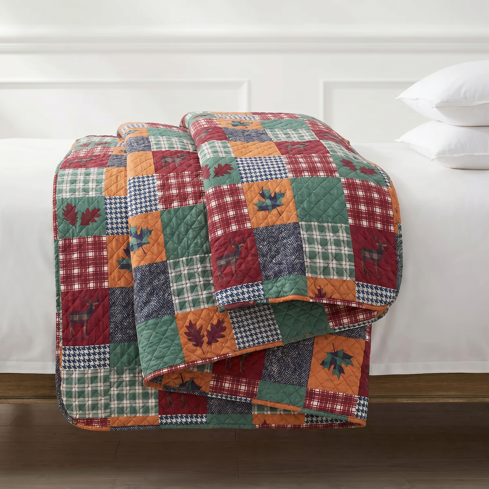 Patchwork quilt with autumnal patterns on a bed