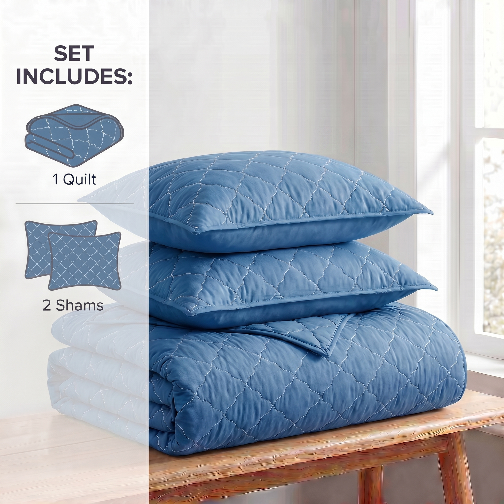 Blue quilt set with two shams on a wooden bench in a bright room.